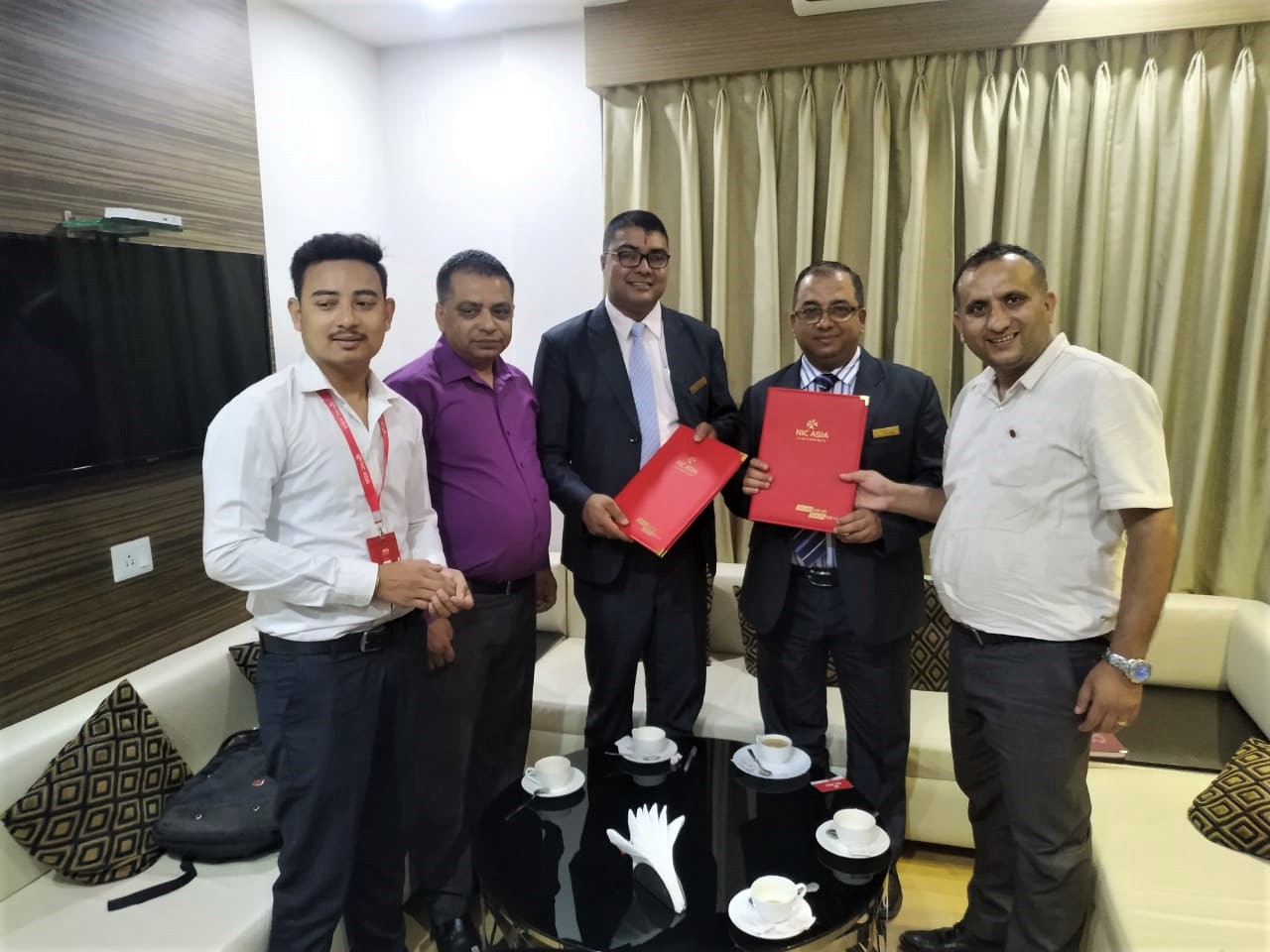 एन आई सी एशिया बैंक र होटल ह्यारिसन प्यालेसबीच सम्झौता