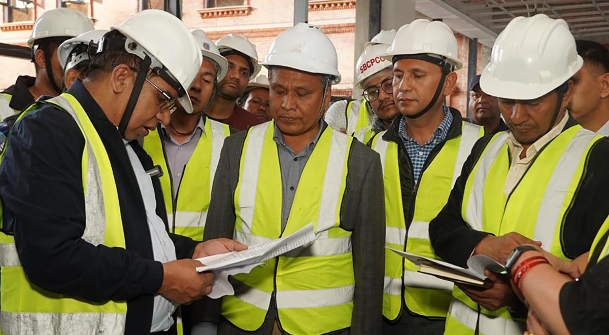 संसद् भवनको काम समयमै नसकाए जरिवाना तिराउने मन्त्री घिसिङको चेतावनी